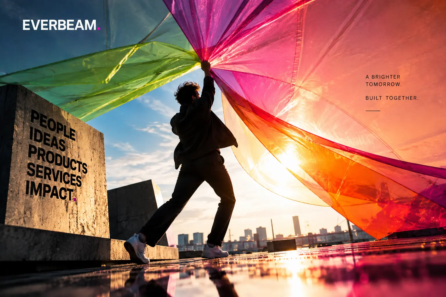 A maker lifting a vivid canopy over an urban landscape